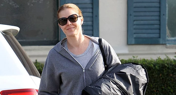 In a shocking transformation, Amy Adams is layered with fur and a few extra pounds for her role as a bloodthirsty hound