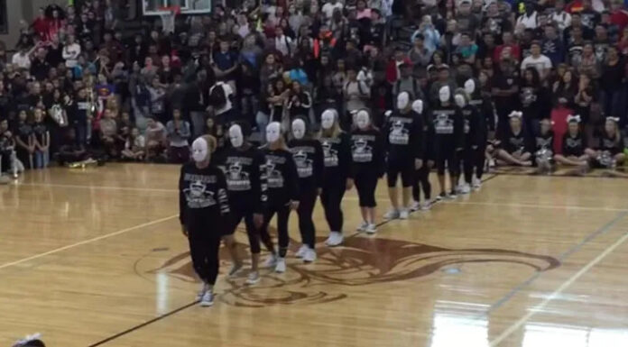 Football players think pep rally is over until their moms line up for epic dance