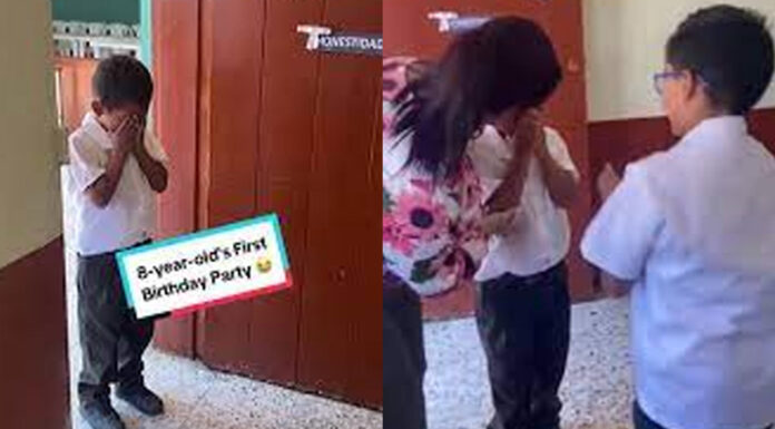 8-yr-old boy opens the classroom door and bursts into tears