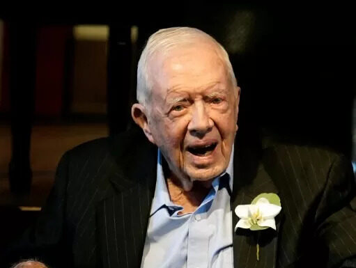 Former President Jimmy Carter arrives in wheelchair at late wife Rosalynn’s funeral