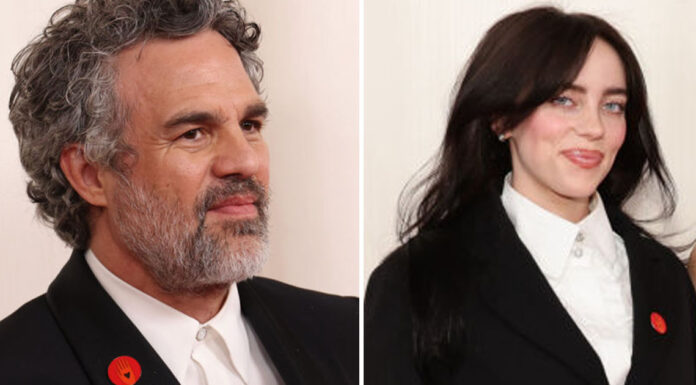 If you saw Hollywood celebrities wearing red pins at the Oscars – you need to know what it means