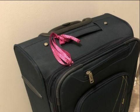 Why You Should Never Tie a Ribbon on Your Luggage, According to a Baggage Handler