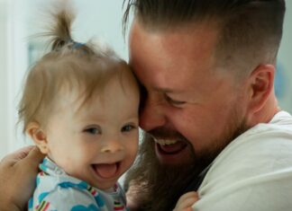 Single dad adopts boy with Down syndrome no one wanted
