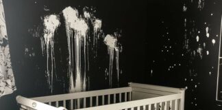 I came home after giving birth to discover my baby’s room completely destroyed and painted black