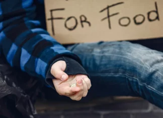 I gave my coat to a homeless woman; three years later, she returned with a gray case and a smile