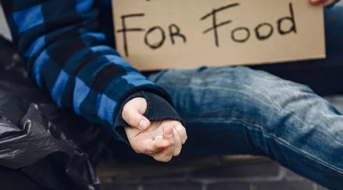 I gave my coat to a homeless woman; three years later, she returned with a gray case and a smile