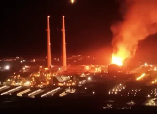 Which areas must evacuate after the fire at the Central California power plant?