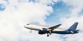 In a bustling district, a small plane crashed into a bus and exploded