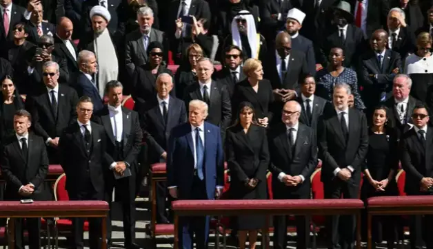 Trump made a comment about the upcoming funeral of Pope Francis that enraged many and wore a blue suit while everyone else wore black.