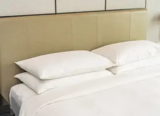 What’s the purpose of the fabric strip across hotel beds?