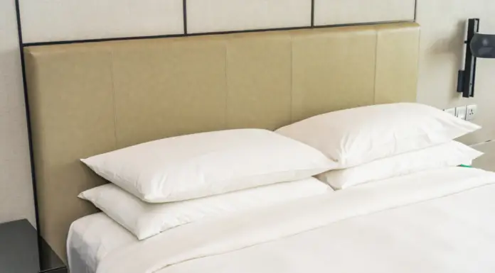 What’s the purpose of the fabric strip across hotel beds?