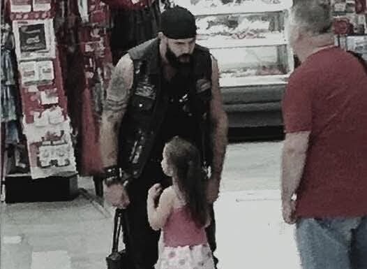 Mute girl rushes to scary biker at Walmart knowing his secret